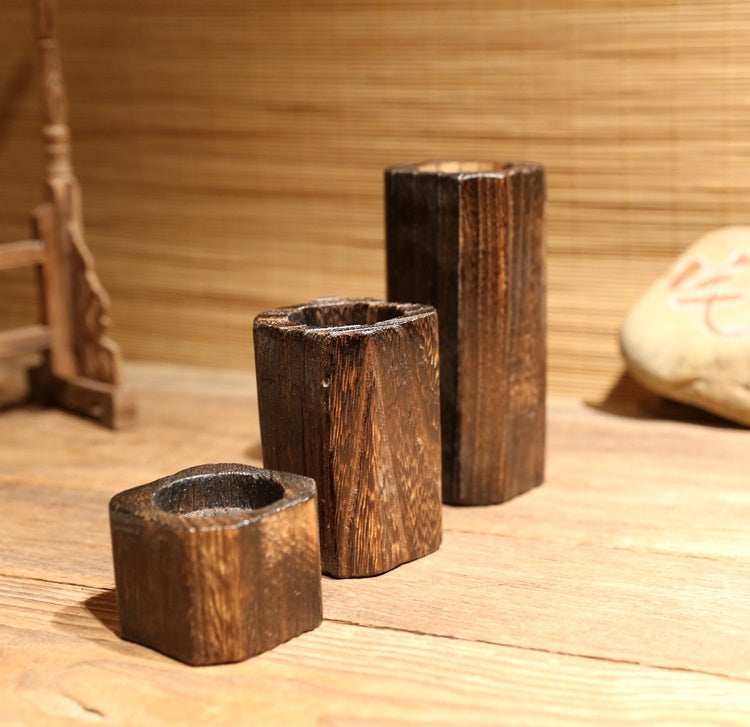 "Ornement de table en bois naturel, support de bougie cuisson au charbon, idéal pour une ambiance chaleureuse."